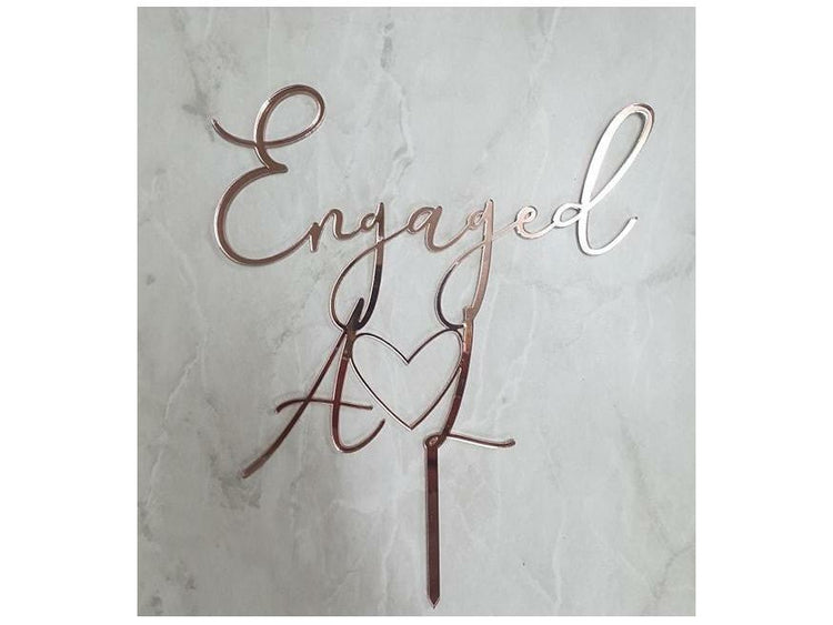 Cake Topper; cake topper Queensland, cake topper , themed cakes, engagement cakes.